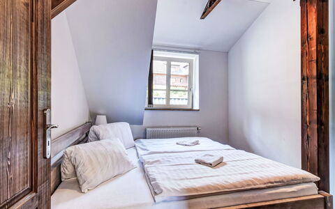 Zadov: Bedroom, Flooring, Wood, Floor, Bed, Furniture, Interior Design, Ceiling, Bedding, Bed Sheet
