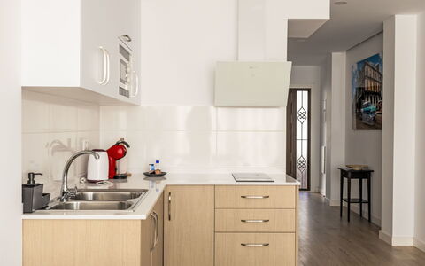 Camino del Río - Caminito del Rey: Kitchen, Countertop, Furniture, Kitchen Appliance, Cabinetry, Major Appliance, Wood, Flooring, Interior Design, Sink
