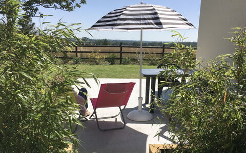 Mahionias'S Cottage: Umbrella, Furniture, Outdoor Furniture, Chair, Shade, Garden, Outdoor Table, Yard, Design, Backyard