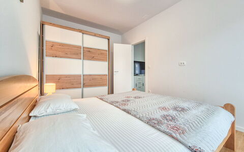Marija: Bed, Interior Design, Bedroom, Furniture, Wood, Ceiling, Bedding, Bed Sheet, Floor, Flooring