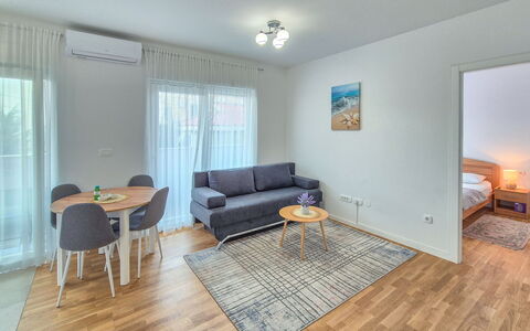 Marija: Flooring, Interior Design, Floor, Ceiling, Room, Furniture, Wood Flooring, Apartment, Couch, Living Room