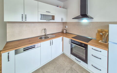 Marija: Countertop, Kitchen, Flooring, Cabinetry, Wood, Major Appliance, Kitchen Appliance, Floor, Interior Design, Room