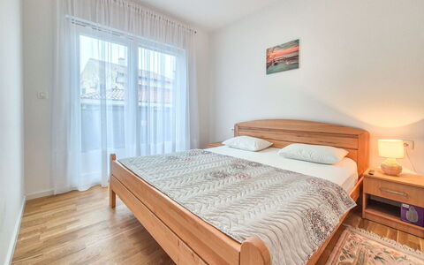 Marija: Bed, Bedroom, Bed Sheet, Interior Design, Bedding, Wood, Floor, Flooring, Room, Linens