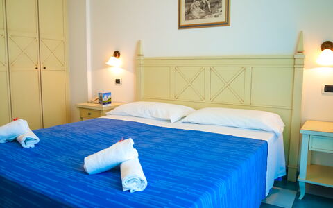 Residence Villarosa Pool and Beach: Furniture, Flooring, Floor, Swimming Pool, Resort, Chair, Hotel, Bedroom, Bed Frame, Bed