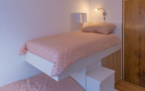 Holyday Home Midas: Bed, Furniture, Bedroom, Interior Design, Wall, Bed Sheet, Bedding, Floor, Wood, Linens