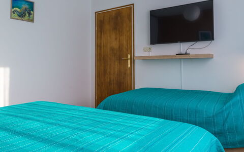 Holyday Home Midas: Furniture, Interior Design, Bed, Floor, Bedroom, Flooring, Wood, Bedding, Bed Sheet, Room