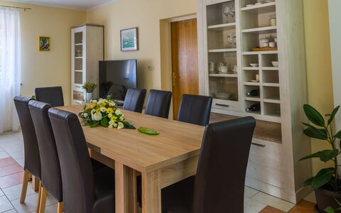 Holyday Home Midas: Furniture, Flooring, Interior Design, Wood, Table, Floor, Kitchen & Dining Room Table, Chair, Dining Room, Room