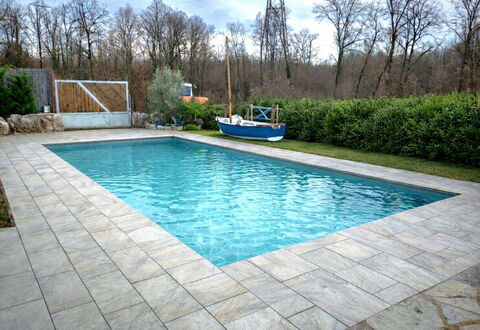 Holyday Home Midas: Swimming Pool, Flooring, Tile, Composite Material, Flagstone, Water Feature, Garden, Concrete, Landscaping, Design
