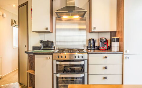 Silversands Retreat: Kitchen Appliance, Kitchen, Major Appliance, Cabinetry, Home Appliance, Wood, Countertop, Interior Design, Kitchen Stove, Stove