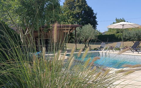 Villa Križanci: Shrub, Garden, Outdoor Furniture, Landscaping, Yard, Backyard, Shade