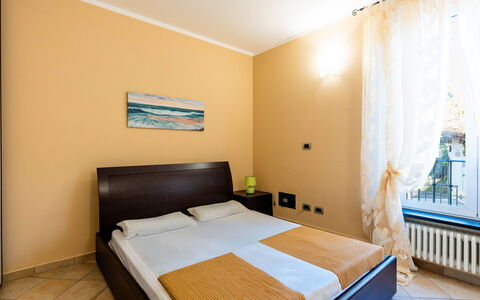 Casa Dany: Interior Design, Furniture, Floor, Flooring, Ceiling, Room, Bed, Lighting, Bedroom, Apartment