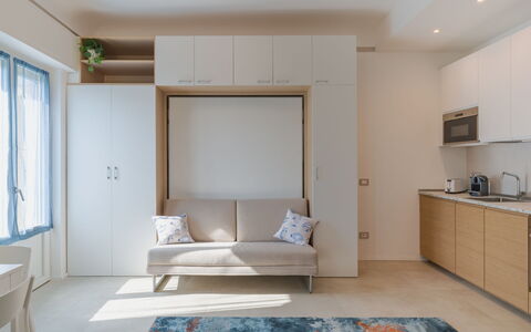 Laccadiva: Furniture, Interior Design, Flooring, Wood, Floor, Couch, Living Room, Room, Lighting, Apartment