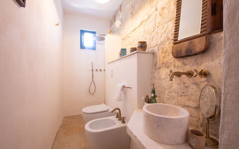 Trulli Valle D'Itria - Martina Franca: Wall, Flooring, Plumbing Fixture, Floor, Bathroom, Interior Design, Plumbing, Bathroom Sink, Toilet Seat, Sink