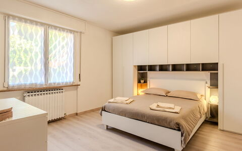 La Finestra su Bellagio: Furniture, Interior Design, Bed, Bedroom, Wall, Flooring, Floor, Wood, Ceiling, Room
