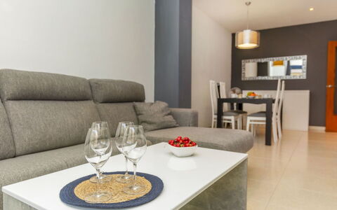 Solymar: Furniture, Flooring, Interior Design, Wood, Floor, Room, Home, Cabinetry, Living Room, Television