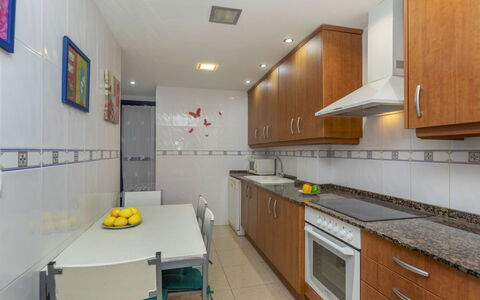 Solymar: Kitchen, Flooring, Countertop, Major Appliance, Kitchen Appliance, Floor, Interior Design, Furniture, Cabinetry, Kitchen Sink