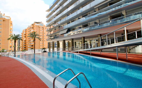Elegance: Water, Building, Sky, Cloud, Azure, Window, Swimming Pool, Condominium, Tower Block, Leisure