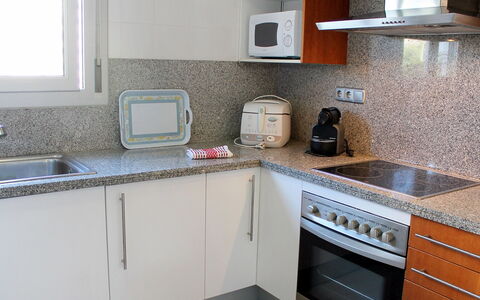 Elegance: Countertop, Property, Room, Kitchen, Cabinetry, Furniture, Tile, Kitchen Stove, House, Building