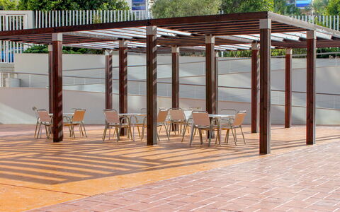 Elegance: Furniture, Building, Wood, Shade, Bicycle, Outdoor Furniture, Tree, Urban Design, Floor, Outdoor Table