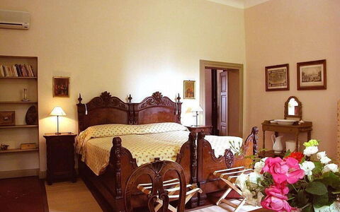 Villa Castellani: Furniture, Interior Design, Bed, Bedroom, Wood, Room, Flooring, Bed Sheet, Bedding, Floor