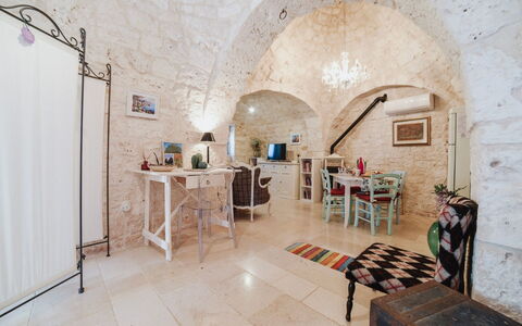 Trulli al Verde Viburno: Interior Design, Furniture, Flooring, Ceiling, Floor, Chair, Room, Light Fixture, Apartment, Living Room