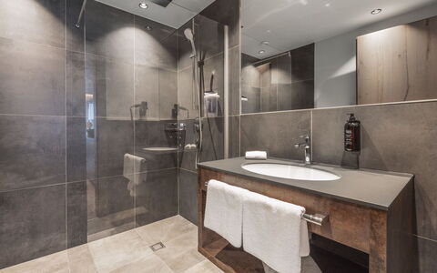 Ischgl 120: Flooring, Floor, Interior Design, Plumbing Fixture, Bathroom, Plumbing, Ceiling, Tile, Hardwood