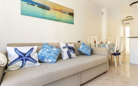 Ca la Flama: Furniture, Flooring, Floor, Interior Design, Apartment, Couch, Sea, Room, Throw Pillow