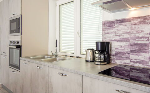 Senj 122: Kitchen, Countertop, Flooring, Interior Design, Cabinetry, Wood, Kitchen Appliance, Major Appliance, Furniture, Floor