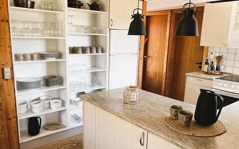 Monna - from the Sea: Kitchen, Flooring, Furniture, Wood, Countertop, Cabinetry, Interior Design, Kitchen Appliance, Floor, Cupboard