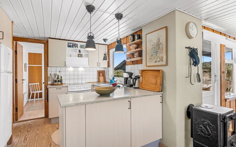 Monna - from the Sea: Wood, Kitchen, Furniture, Cabinetry, Countertop, Kitchen Appliance, Major Appliance, Ceiling, Home Appliance, Wood Stain