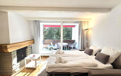 La Riva Mountain Apartment: Furniture, Wood, Interior Design, Flooring, Floor, Textile, Ceiling, Room, Bedroom, Bed