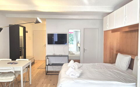 La Riva Mountain Apartment: Furniture, Interior Design, Floor, Flooring, Wood, Ceiling, Bedroom, Bed, Room, Apartment