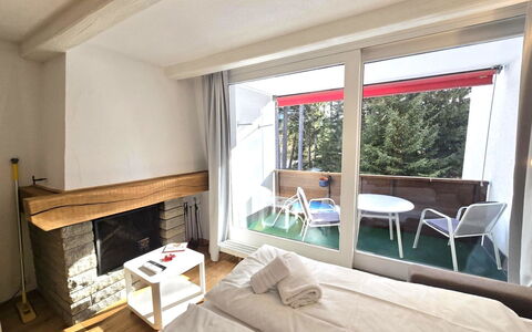 La Riva Mountain Apartment: Chair, Linens, Daylighting, Balcony, Pillow