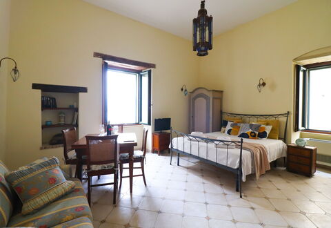 Scilla Centro Storico Otranto: Furniture, Interior Design, Wall, Bedroom, Bed, Flooring, Floor, Ceiling, Room, Lighting