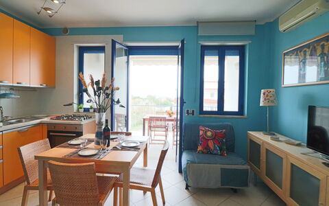 Circe Sea View: Furniture, Interior Design, Chair, Table, Kitchen & Dining Room Table, Floor, Room, Apartment, Dining Room, Wood Stain