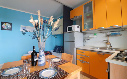 Circe Sea View: Wood, Interior Design, Furniture, Orange, Apartment, Kitchen, Room, Chair, Countertop, Cabinetry