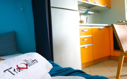 Circe Sea View: Furniture, Interior Design, Textile, Room, Lighting, Orange, Floor, Bedroom, Bed, Comfort