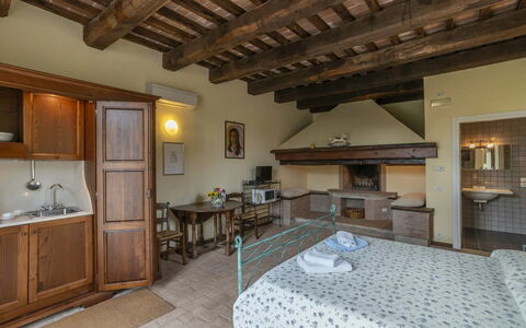 Agriturismo le Case Rosse di Montebuono: Furniture, Wall, Home, Room, Apartment, Ceiling, Bed, Chair, Bed Frame, Drawer