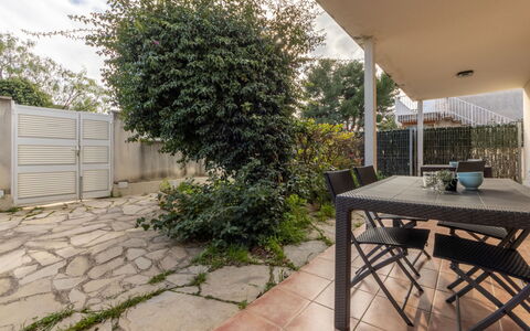 Cambrils 68: Shade, Garden, Outdoor Furniture, Flagstone, Backyard, Landscaping, Yard, Courtyard, Chair, Houseplant