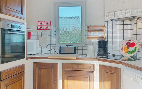 Le Château 3: Kitchen, Kitchen Appliance, Interior Design, Wood, Major Appliance, Countertop, Cabinetry, Flooring, Furniture, Room