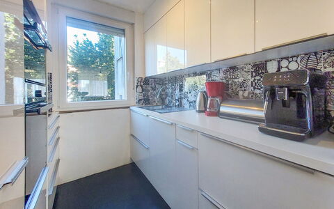 Noemi: Kitchen, Countertop, Kitchen Appliance, Major Appliance, Interior Design, Flooring, Cabinetry, Apartment, Floor, Home Appliance