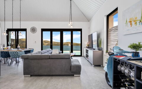 The Tinel: Interior Design, Ceiling, Flooring, Furniture, Floor, Couch, Living Room, Home, Room
