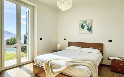 Libellula: Bed, Furniture, Interior Design, Bedroom, Flooring, Floor, Bedding, Wall, Bed Sheet, Room
