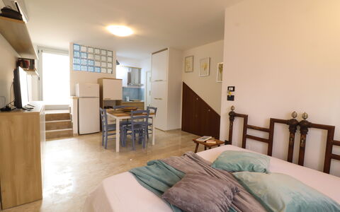 Malika: Furniture, Interior Design, Flooring, Floor, Bed, Bedroom, Wall, Wood, Ceiling, Room