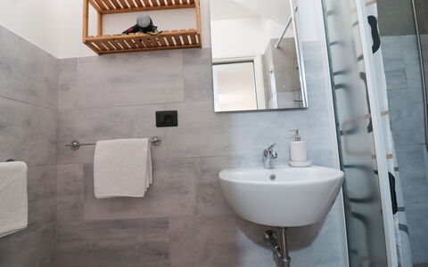 Malika: Wall, Flooring, Interior Design, Floor, Plumbing Fixture, Bathroom, Room, Home, Plumbing, Sink