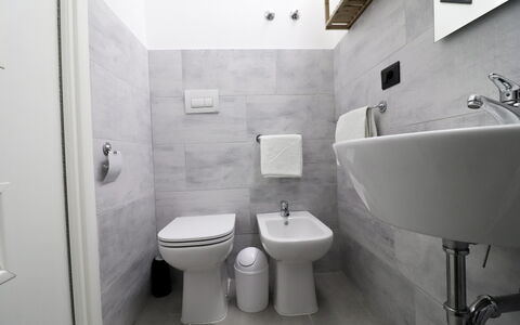 Malika: Flooring, Floor, Plumbing Fixture, Interior Design, Bathroom, Sink, Toilet Seat, Toilet, Home, Plumbing
