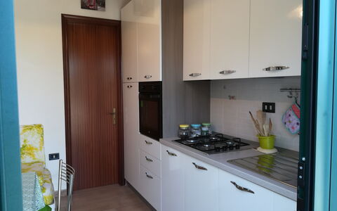 Villa Maddalena: Major Appliance, Kitchen, Flooring, Kitchen Appliance, Interior Design, Countertop, Floor, Cabinetry, Home Appliance, Kitchen Stove