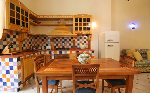 Cariddi Dimora Otranto: Kitchen, Interior Design, Flooring, Furniture, Wood, Floor, Countertop, Kitchen Appliance, Cabinetry, Ceiling