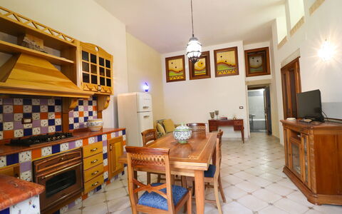 Cariddi Dimora Otranto: Flooring, Interior Design, Furniture, Kitchen, Wood, Floor, Cabinetry, Countertop, Ceiling, Room