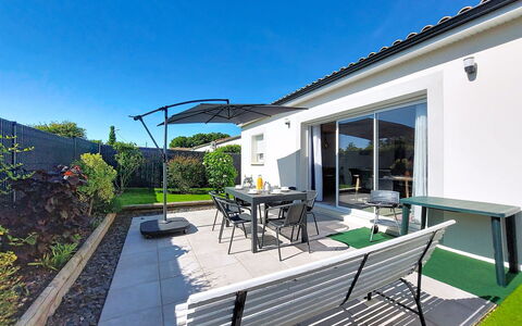 Le Logis: Home, Shade, Outdoor Furniture, Chair, Patio, Balcony, Outdoor Table, Yard, Houseplant, Awning